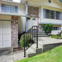 Matte black 2-step courtyard staircase handrail
