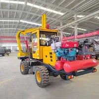 The manufacturer supplies the highway guardrail pile driver, driving and pulling drill integrated machine